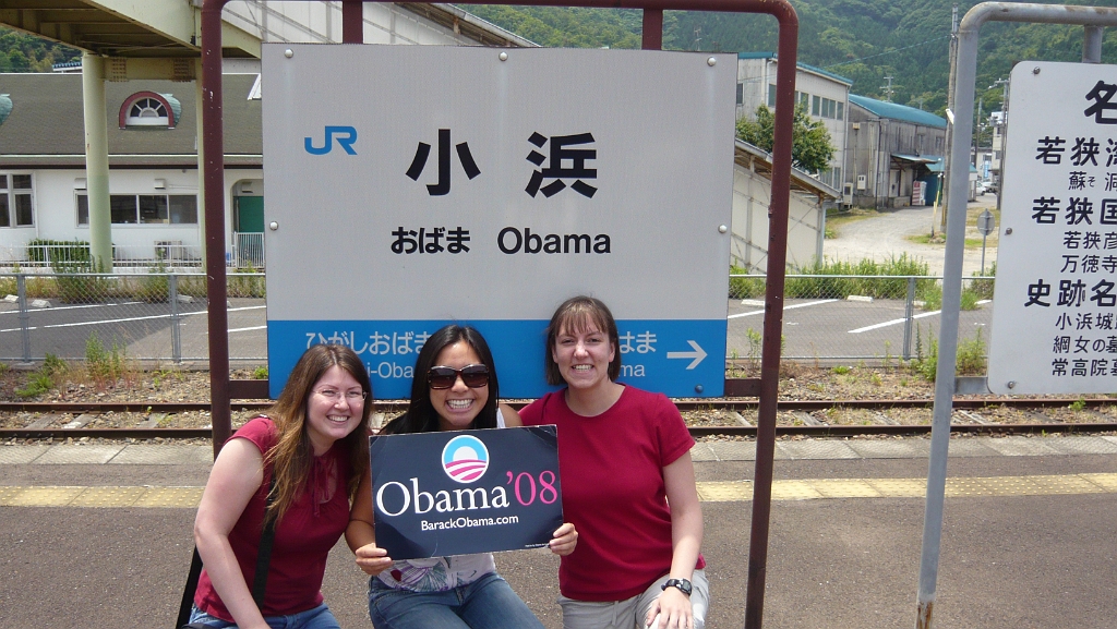 p1010708.jpg - Katie, Myra and me pose in front of the JR station sign.